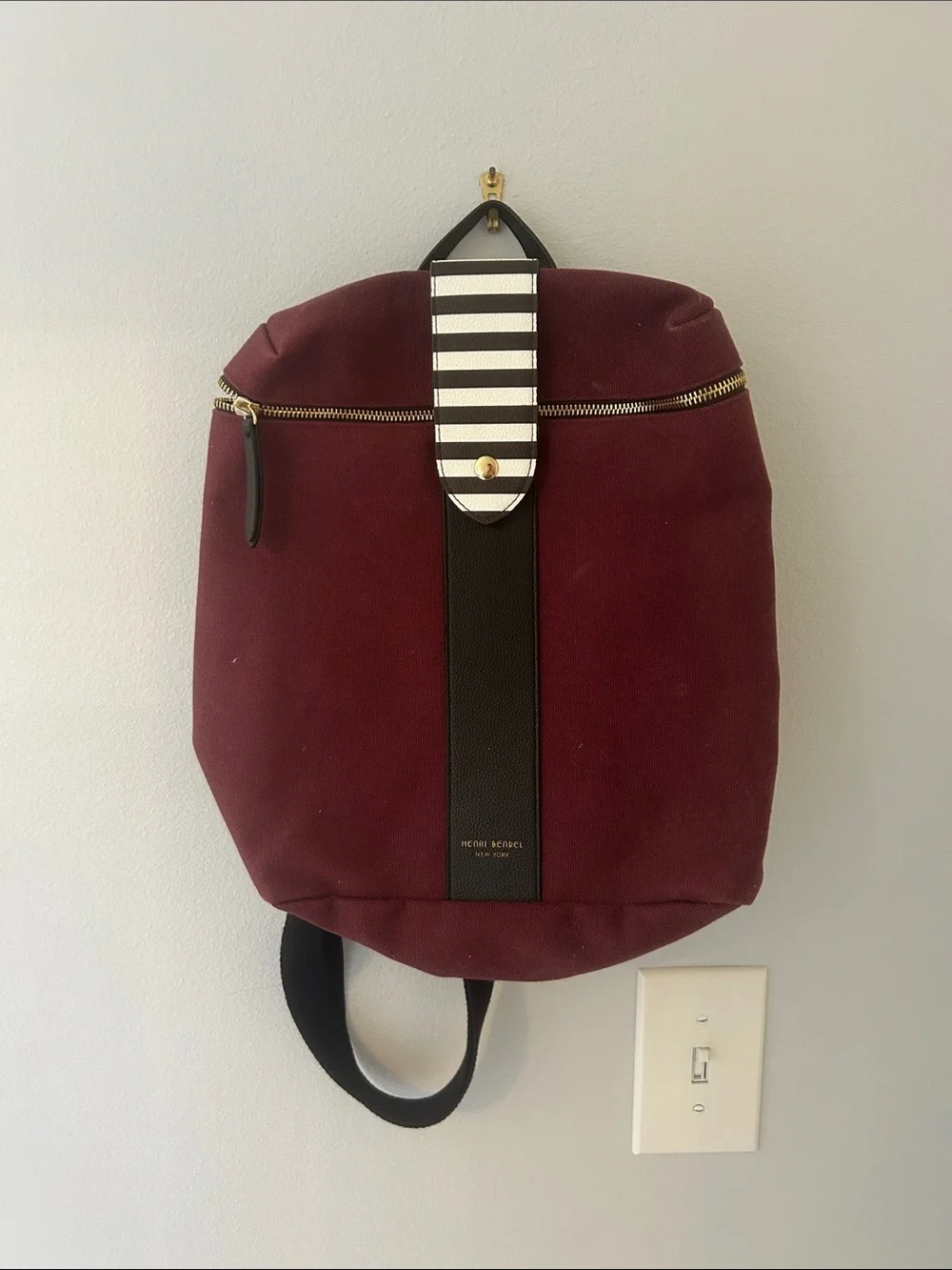 Henri Bendel Burgundy Canvas Backpack with Black Trim and Striped Tab